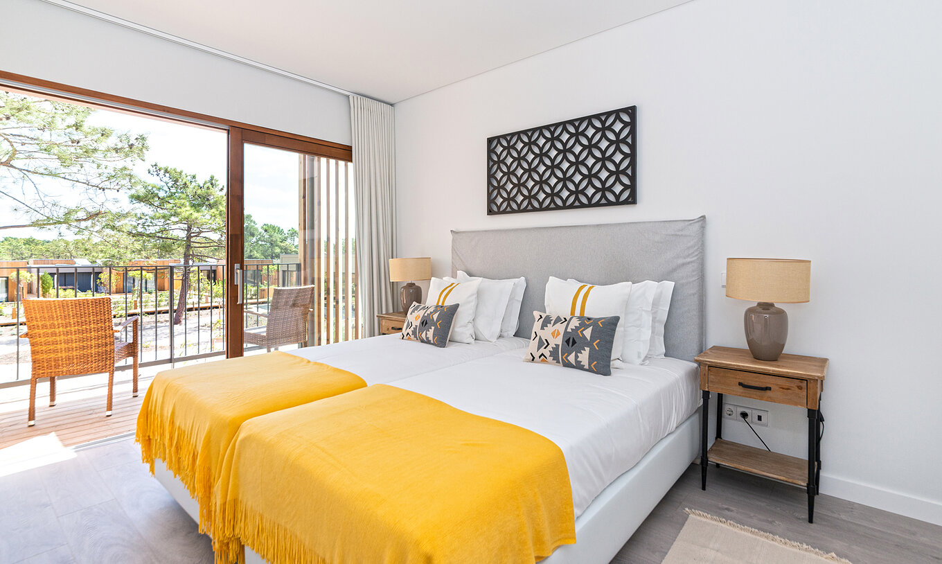 The Eco Village Apartment 1st Floor of Pestana Tróia Eco Resort has two beds combined and a balcony with nature view
