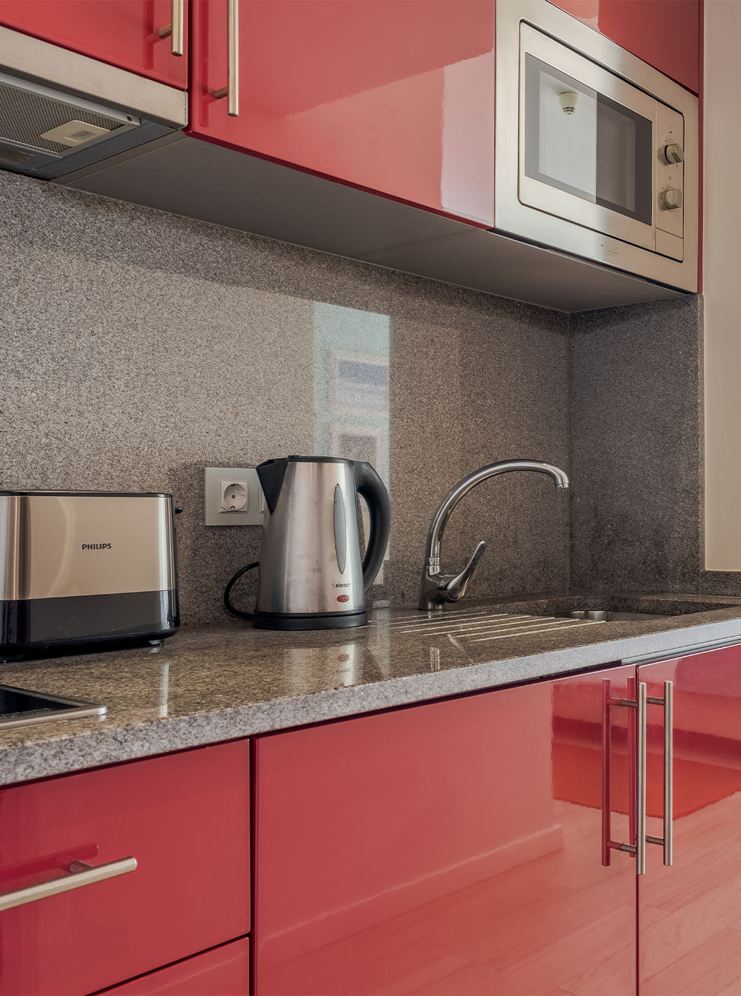 The Sea View Studio at Pestana Alvor Praia has a kitchenette with a microwave, kettle, toaster, and stove