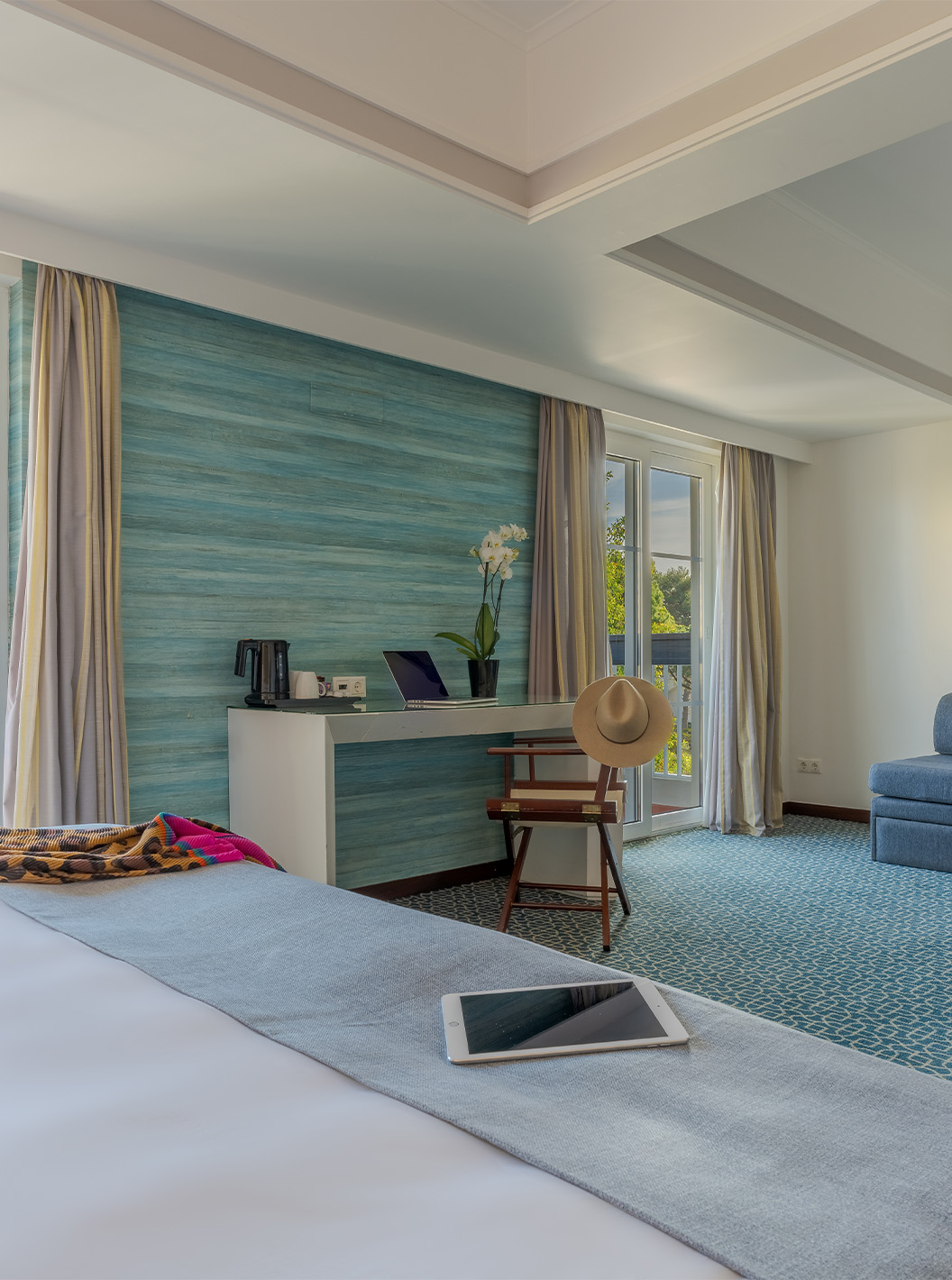 The Superior at Pestana Alvor Praia has a double bed, a sofa bed, and a large window desk with garden views