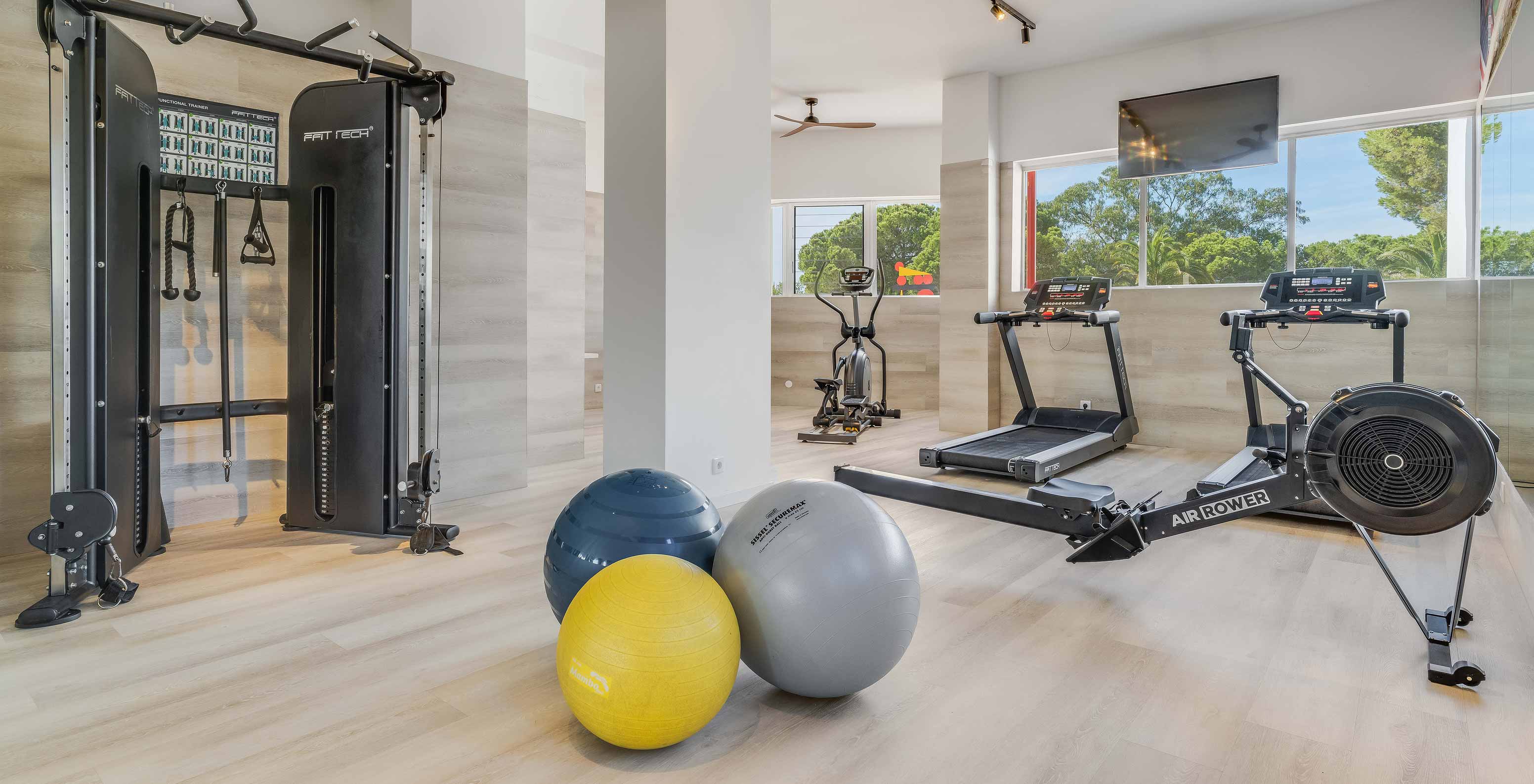 Pestana Blue Alvor Beach, a 5-star hotel with a pool near the beach, has a gym with various machines and pilates balls