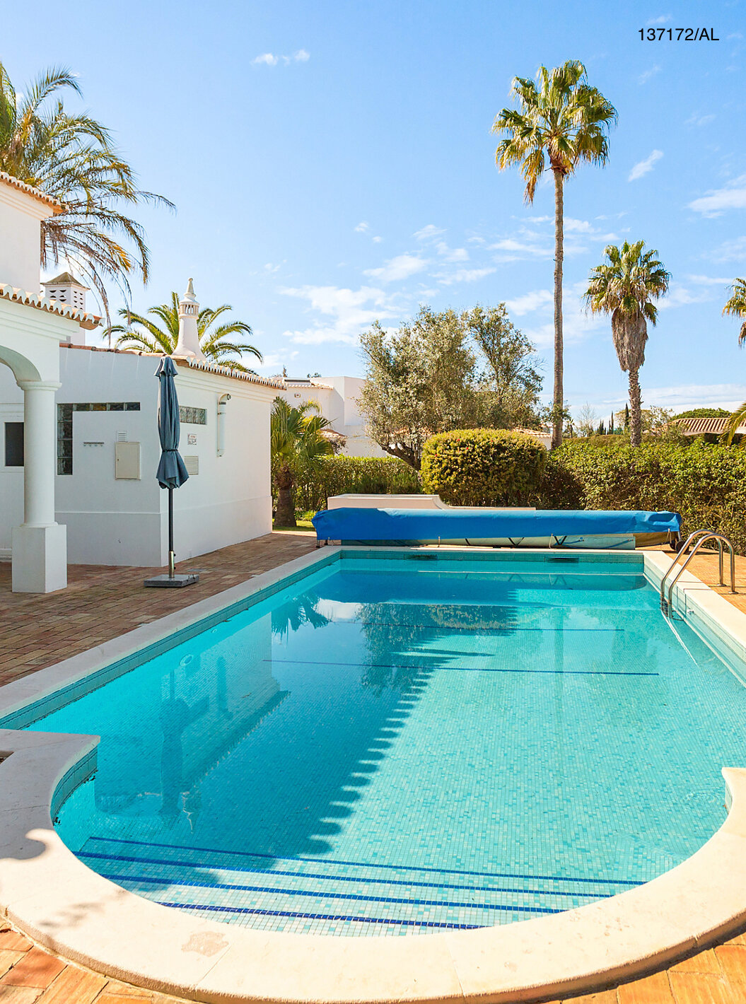 The Pestana Carvoeiro Golf V3 Standard Villa has an exterior patio with a pool and loungers