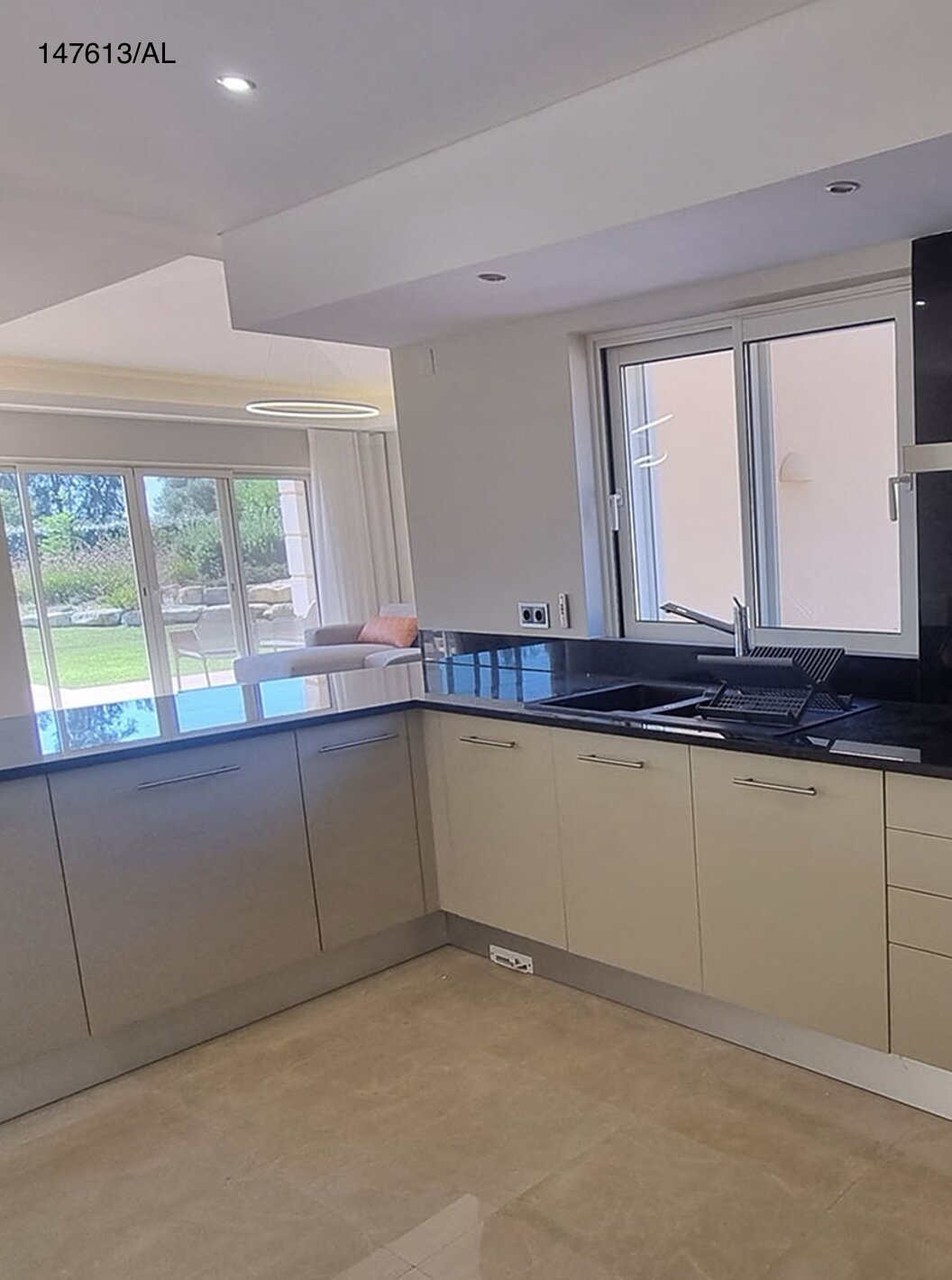 The Pestana Carvoeiro Golf V5 Superior Villa has a modern kitchen equipped with appliances