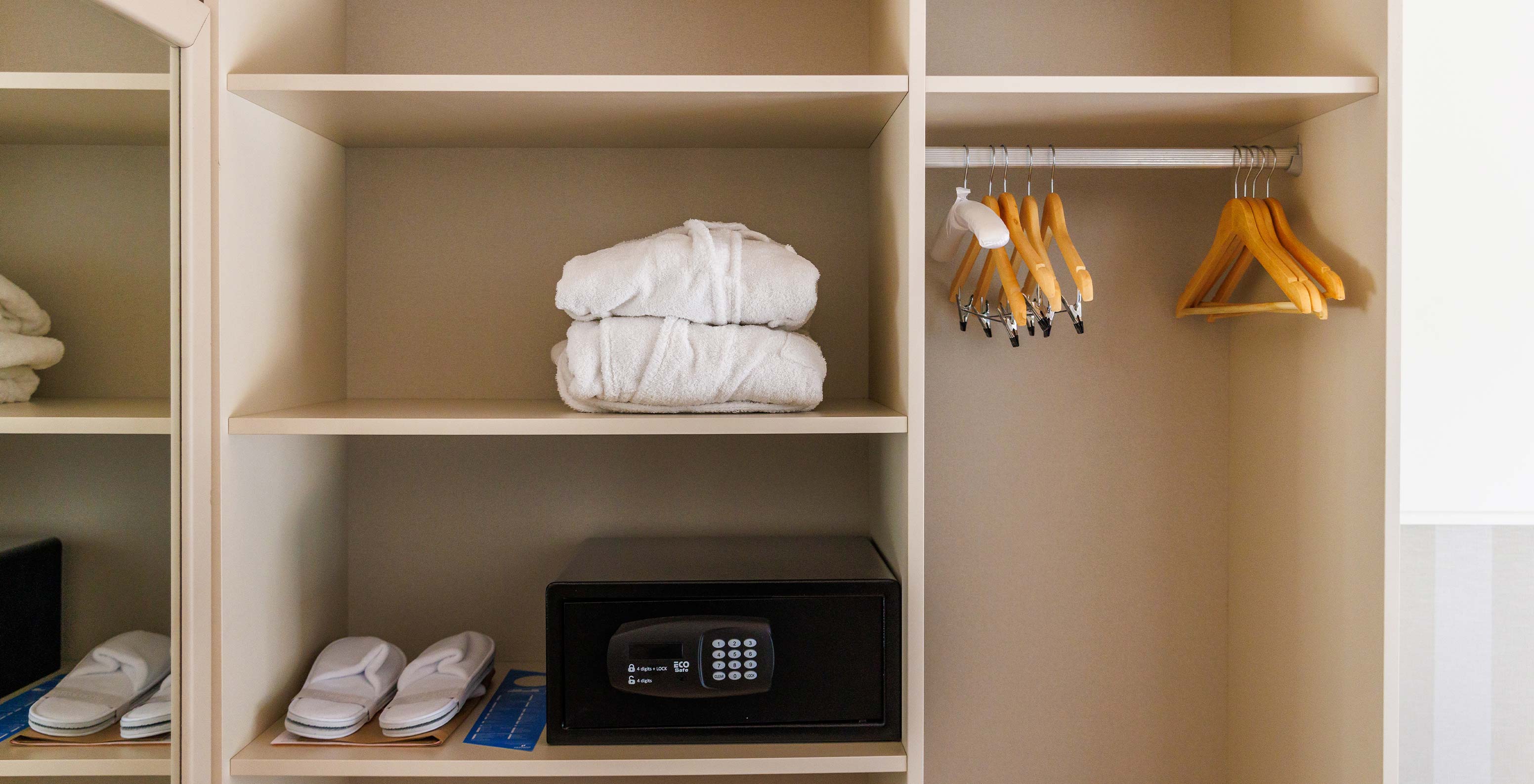 The Family Garden View at Pestana Vila Sol - Vilamoura has a wardrobe with safe, two robes and complimentary slippers