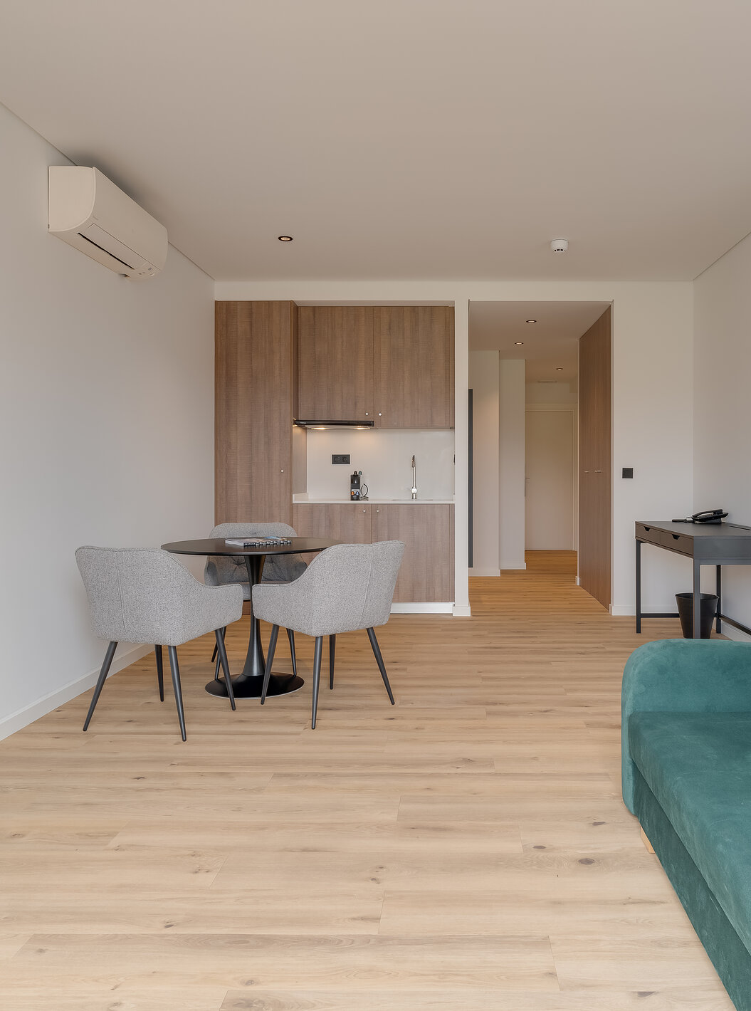 The Family with Balcony - Clubhouse of Pestana Sintra Golf has a sofa, television, air conditioning, a table, and kitchenette