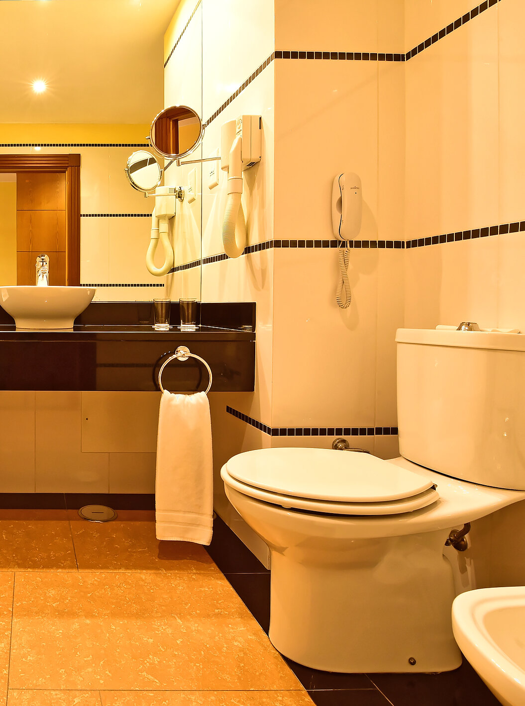 The Superior Double of Pestana Sintra Golf has a bathroom with bathtub, sink with mirror, amenities, and toilet