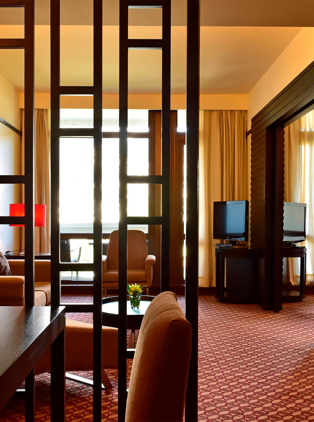 The Family Room at Pestana Casino Park has a bathroom with a bathtub and shower, toilet, and sink