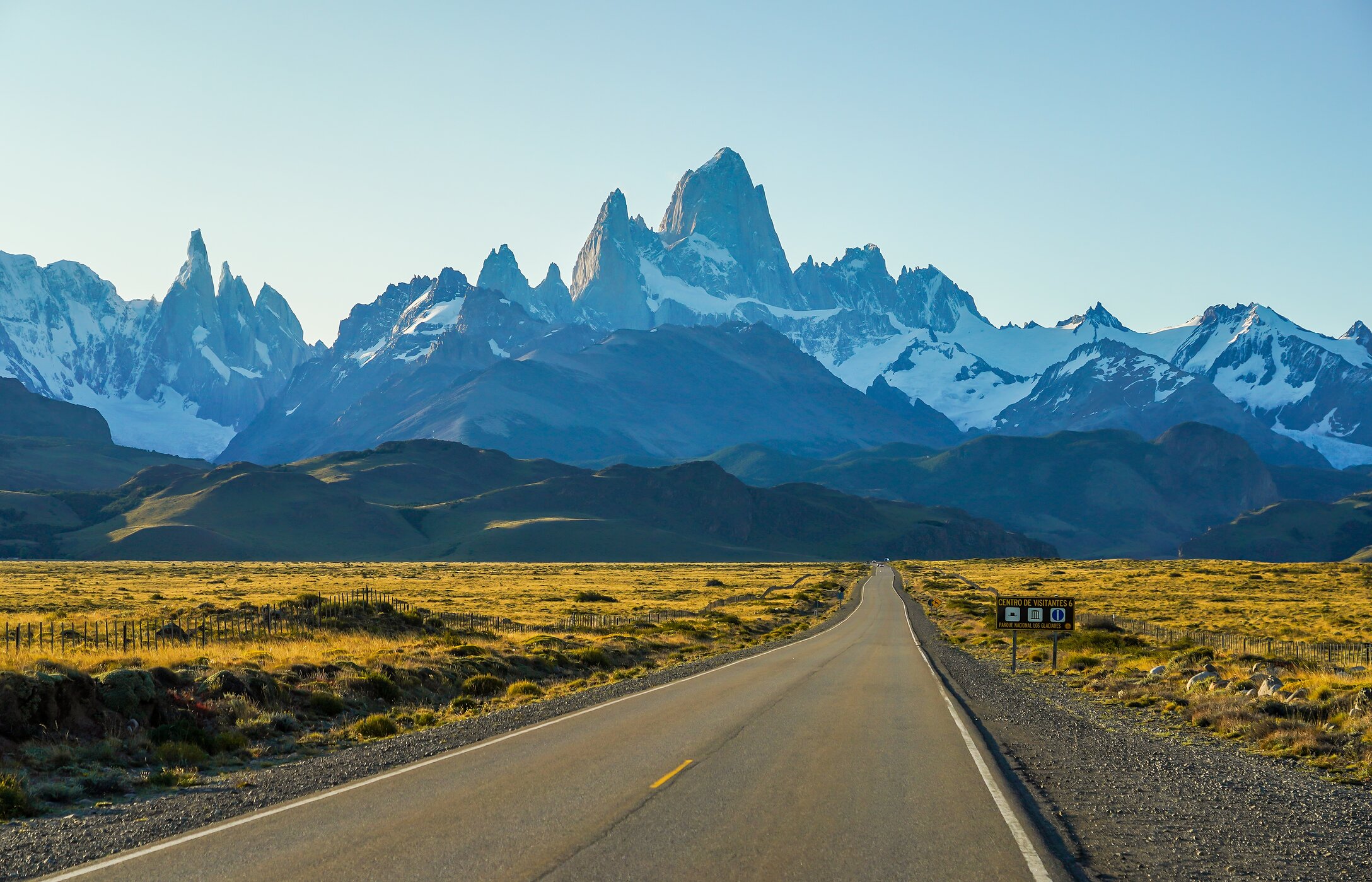  Asphalt road in Argentina with a view of Cerro Fitz Roy, one of Patagonia's most famous peaks