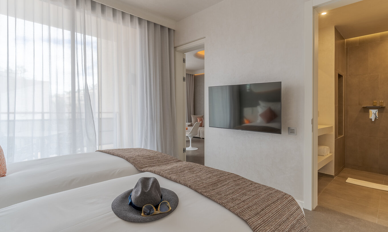 The CR7 Room Avenue at the Pestana CR7 Marrakech has a double bed, a desk and a large window overlooking M Avenue