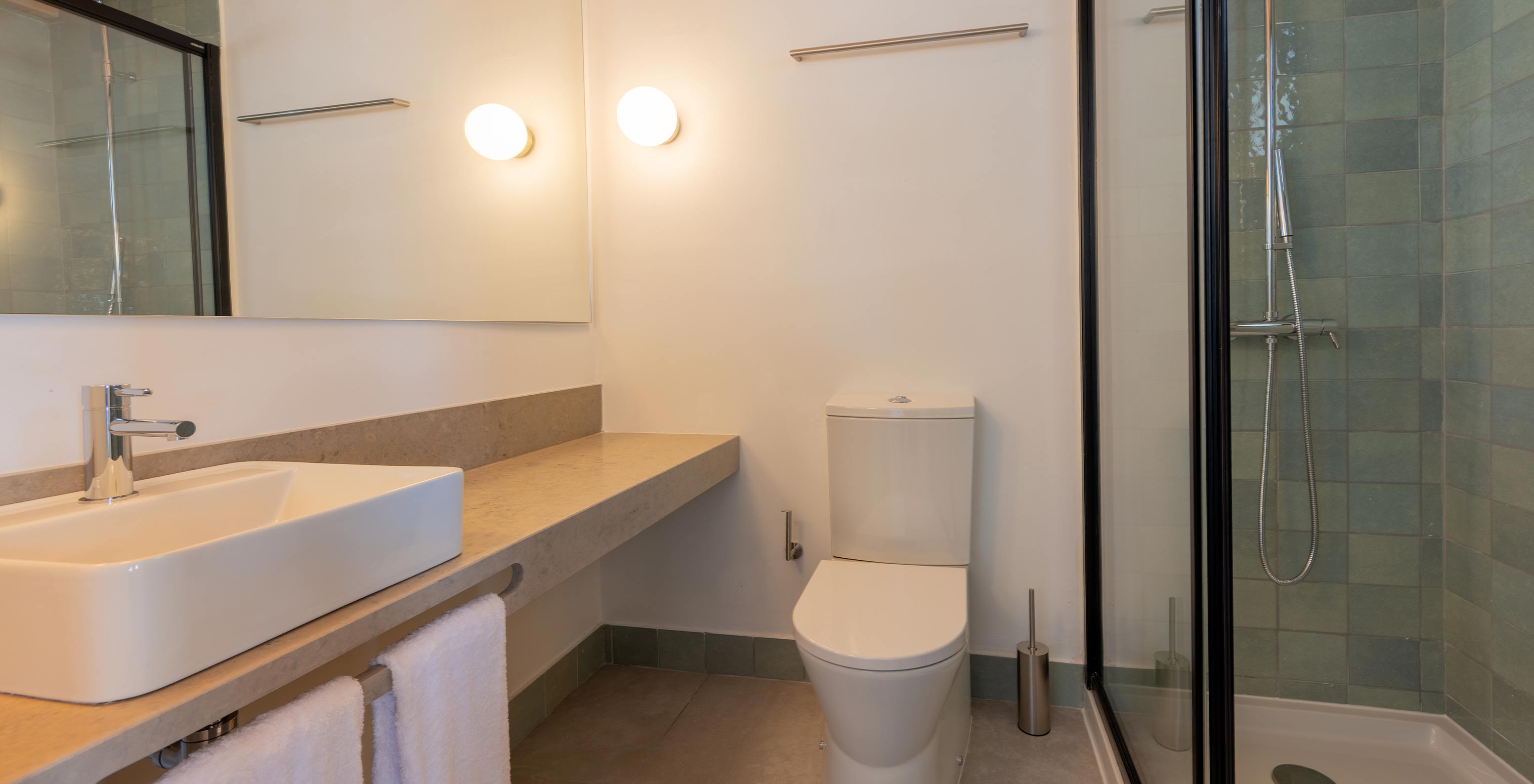 The Standard Villa T1 at Pestana Comporta Village Residences has a bathroom with a sink, a toilet, and a shower