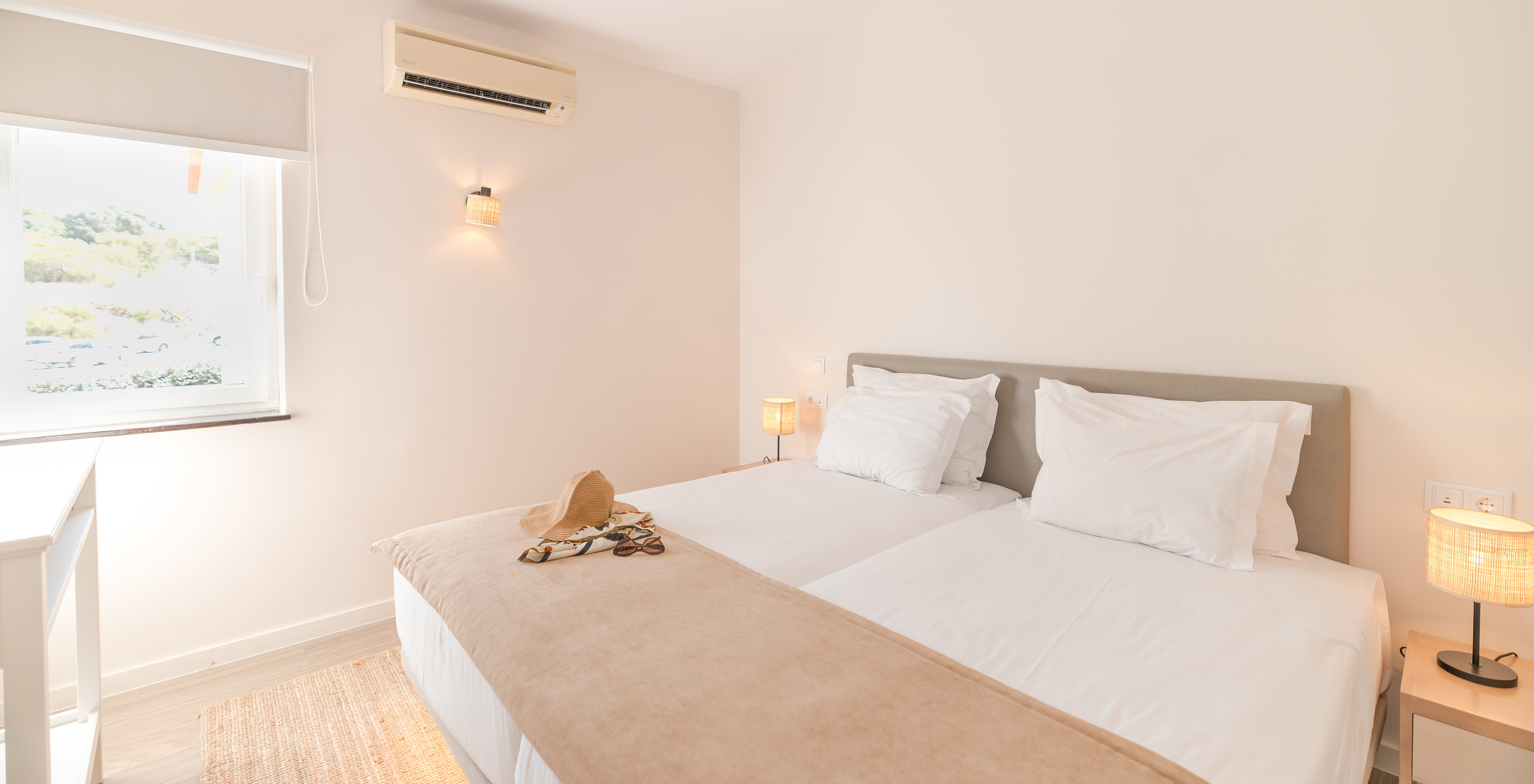 Villa 1 Bedroom Garden View at Pestana Alvor Beach Villas has a double bed, air conditioning and a window