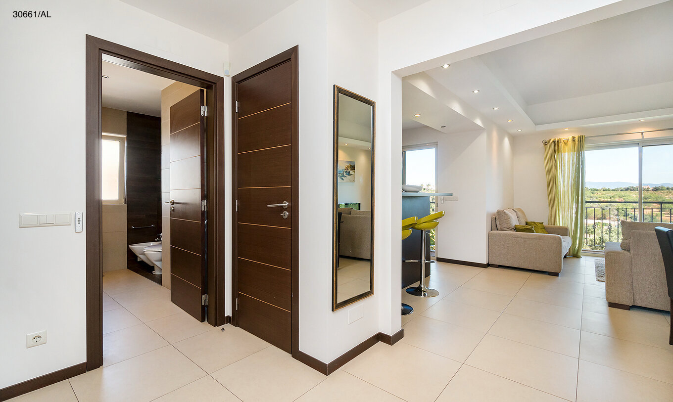 The Pestana Carvoeiro Golf T1 Superior Apartment has an entry hall with a view of the living room and bedroom