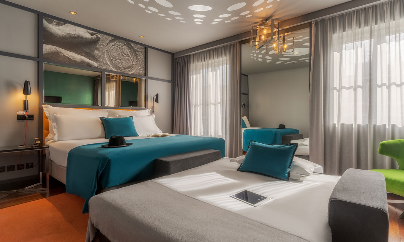The CR7 Family Hat-Trick Room at Pestana CR7 Lisboa features two beds: a double bed and a sofa bed