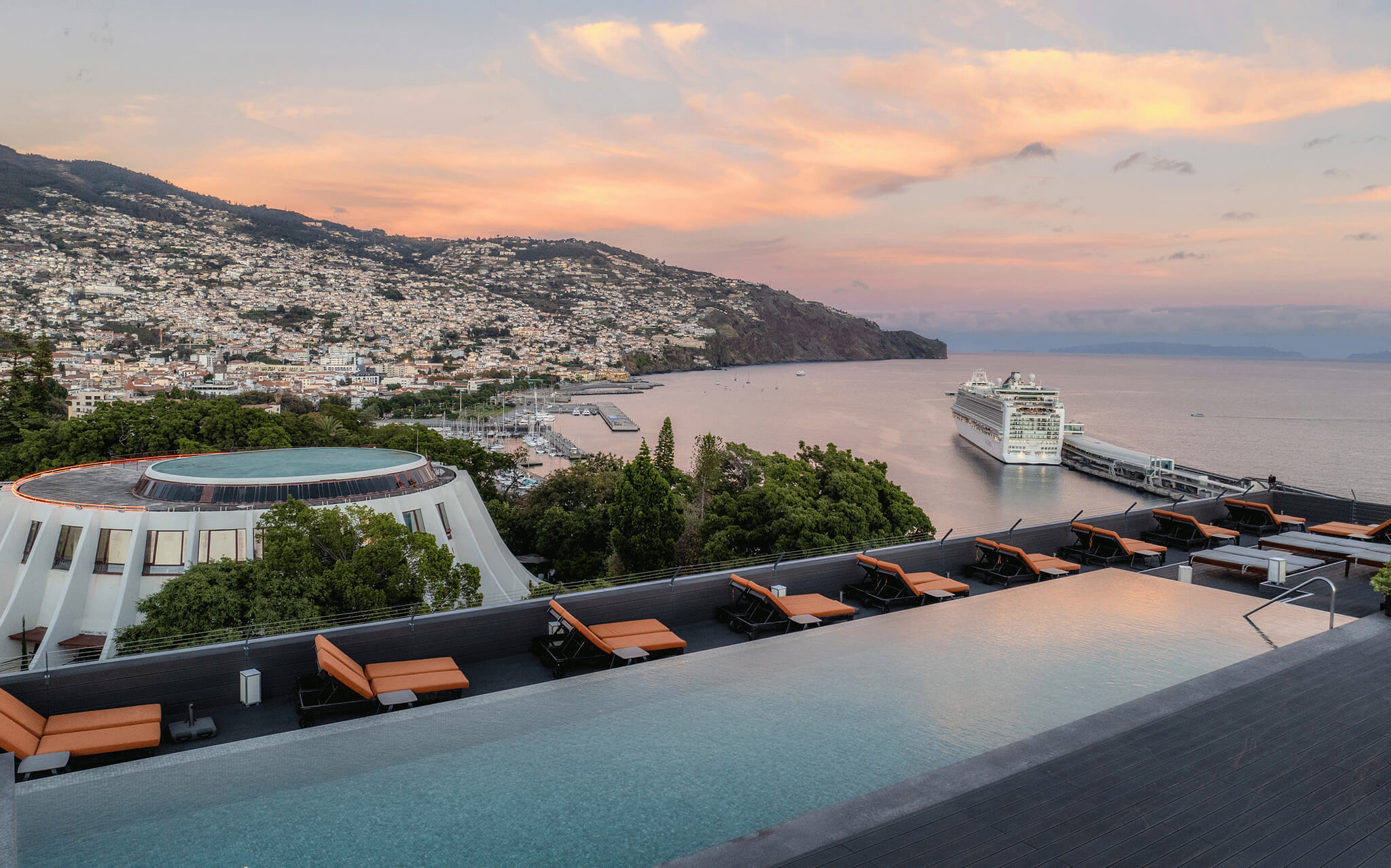 View of the infinity outdoor pool at Pestana Casino Park, a 5-star hotel in the center of Funchal