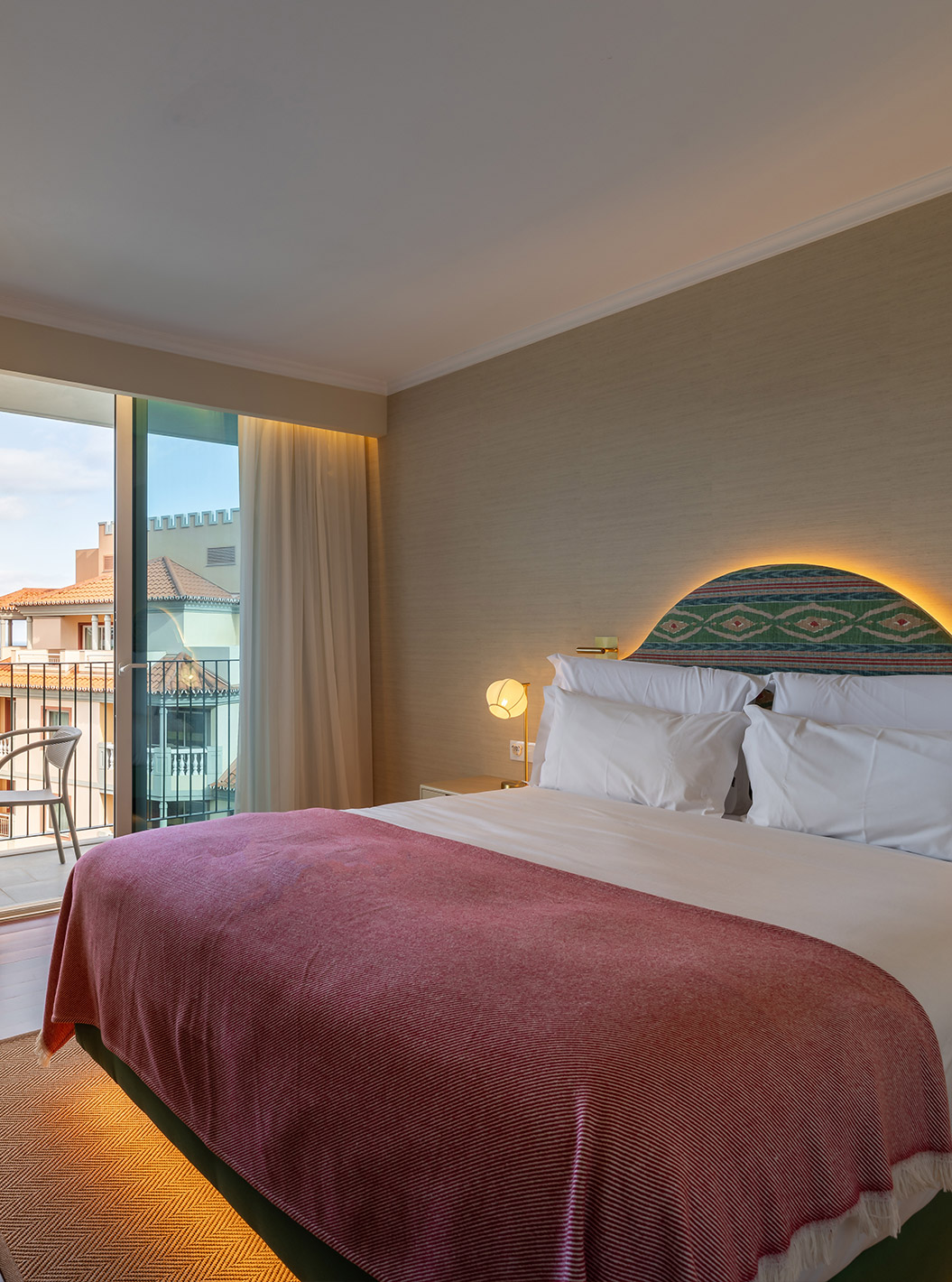 The Partial Sea View Room with Balcony at Pestana Quinta Perestrello has a double bed with a balcony and sea view.