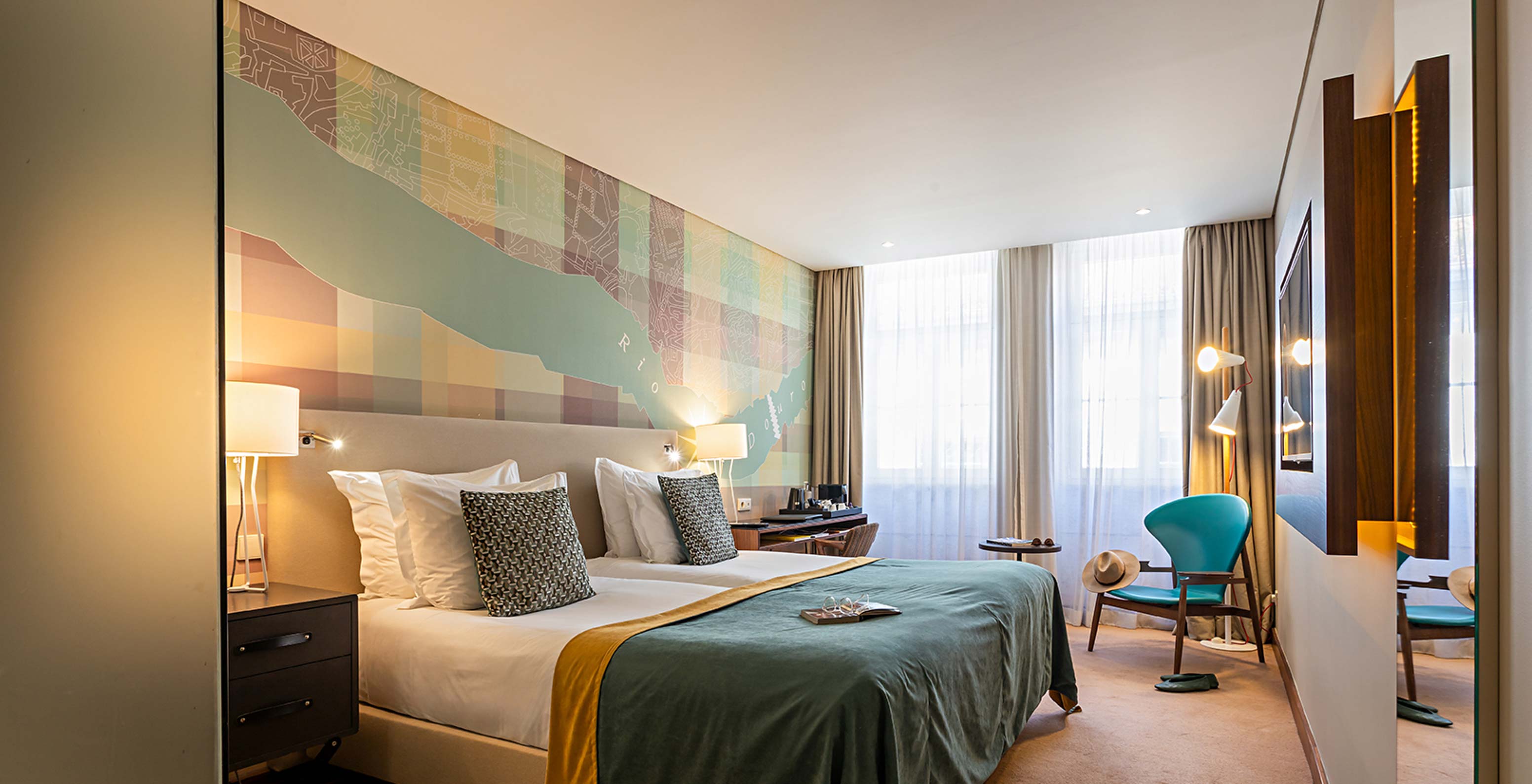 The Superior at Pestana Vintage Porto has a double bed, a support chair and two large windows