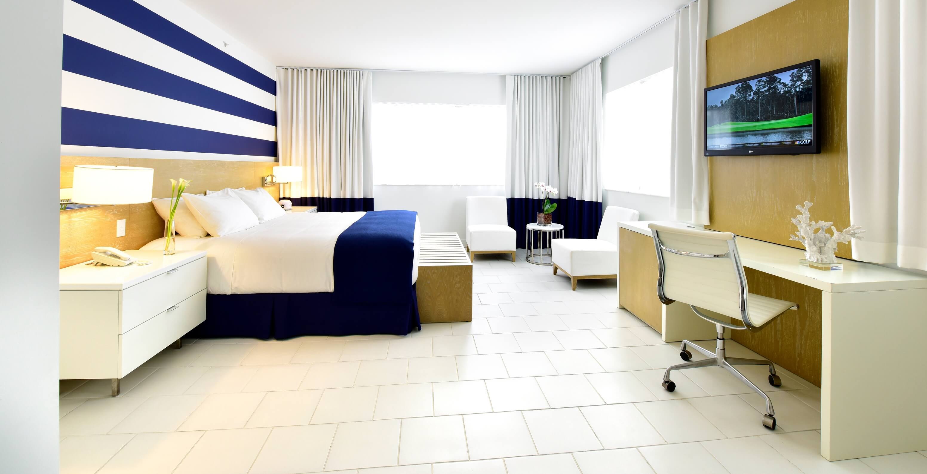 The Superior King - ADA at Pestana Miami South Beach has a double bed, bedside table, TV