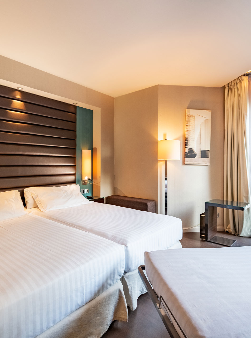 O Superior Família do Pestana Arena Barcelona tem uma janela grande, duas camas induviduais e uma cama extra