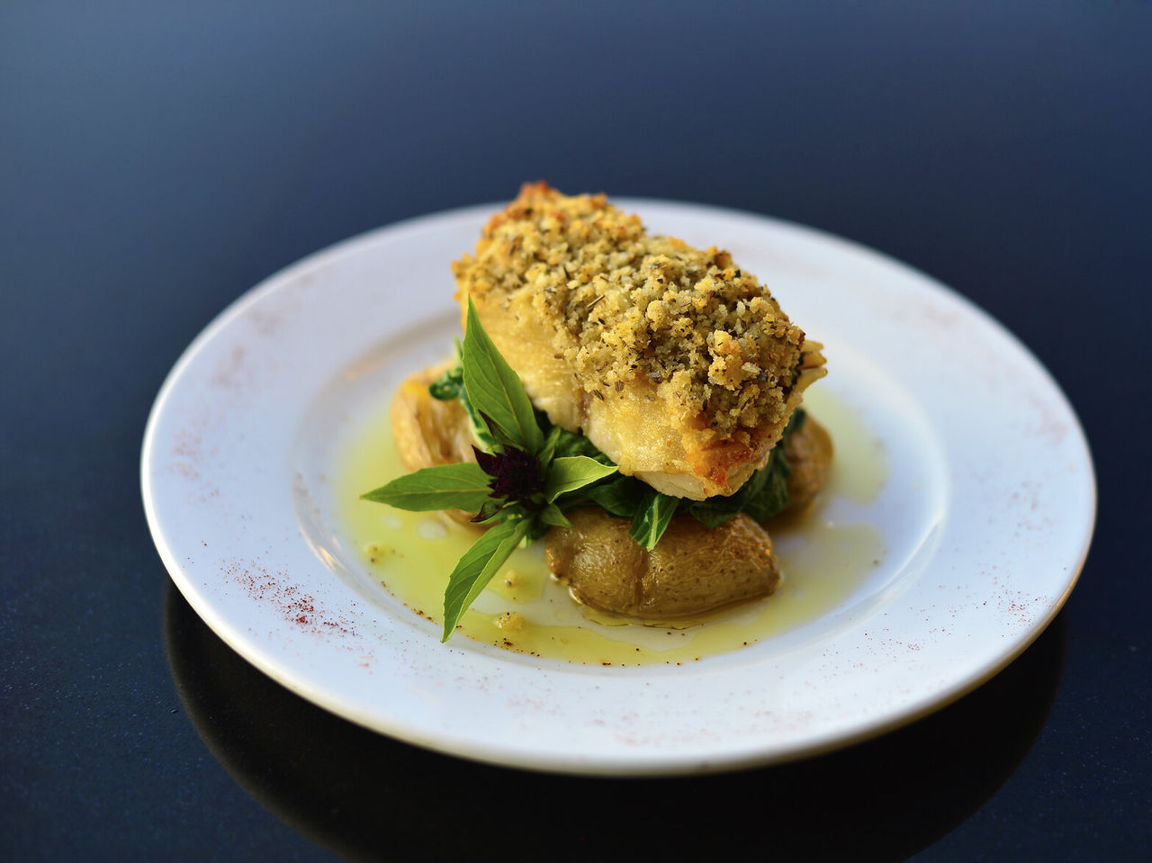 Monomotapa Restaurant at a 4-Star Hotel in Maputo, with Portuguese dishes like cod with corn topping and potatoes
