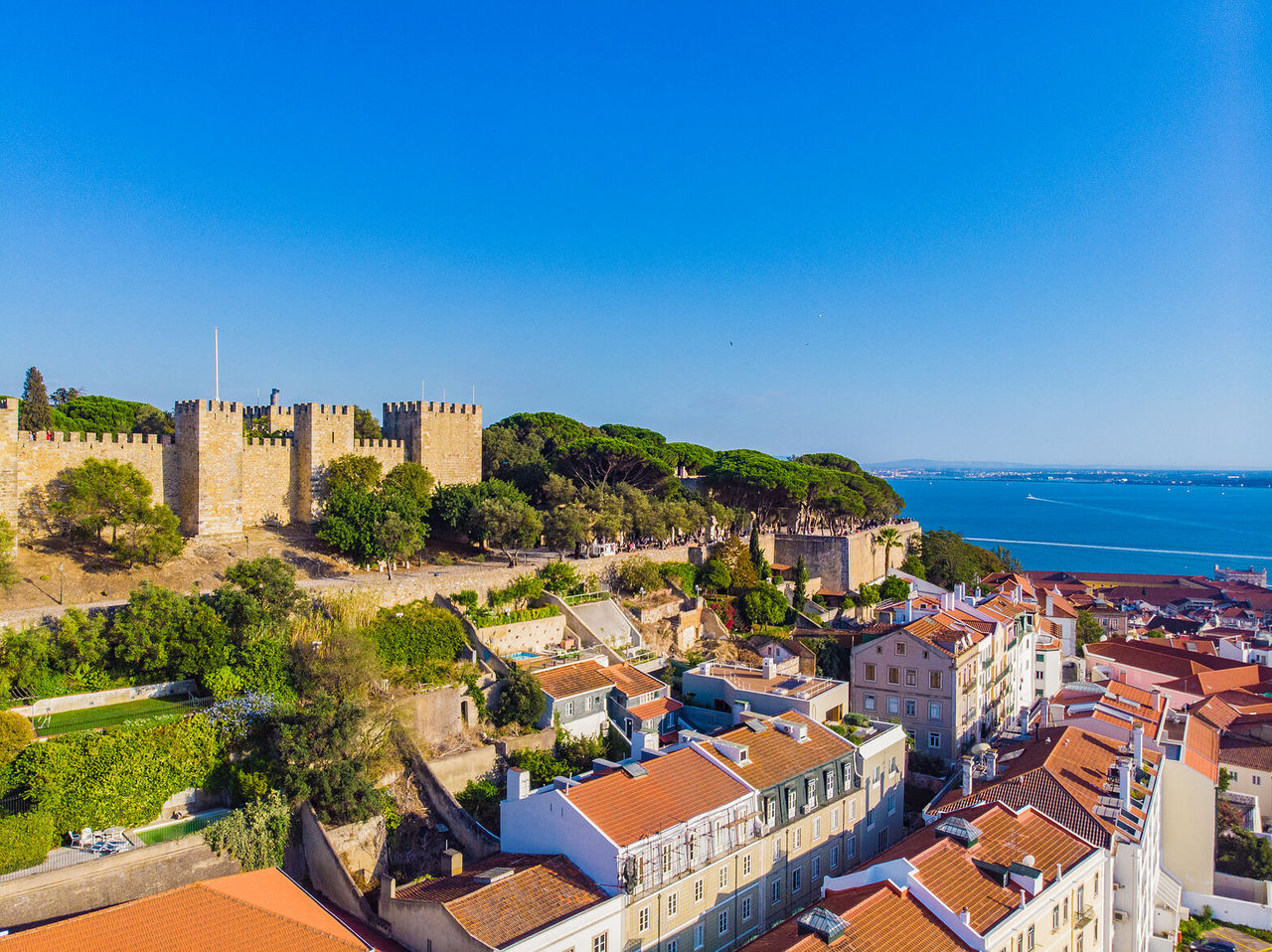 View of the sea in Lisbon, with typical picturesque neighborhoods and amazing historical monuments