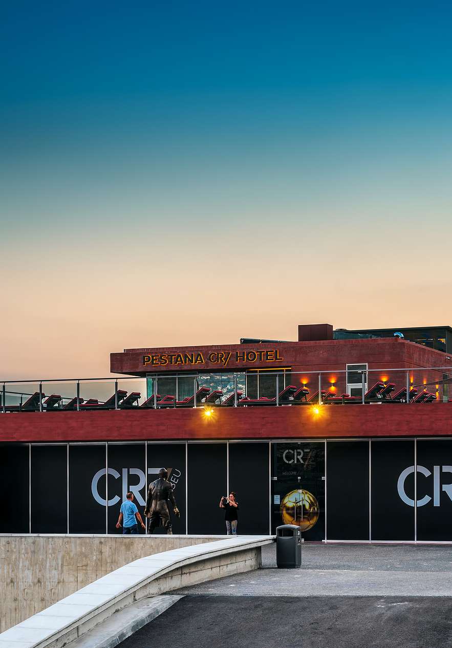 Cristiano Ronaldo Museum next to Pestana CR7 Funchal with people taking pictures with the player's statue