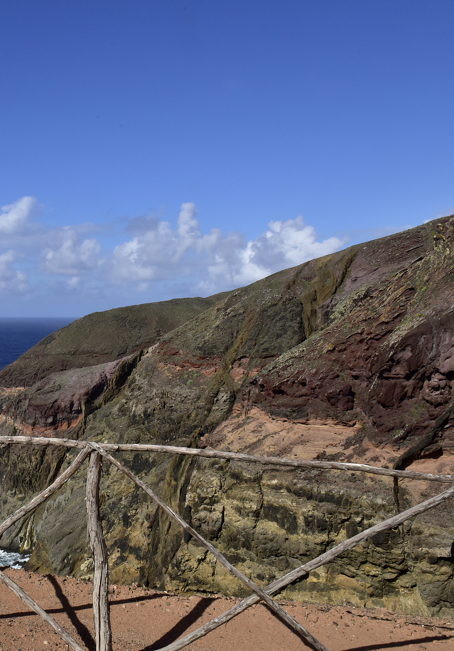 Paths on Porto Santo island in the midst of nature with land elevations by the sea